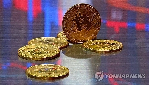 비트코인, 6만 달러선 붕괴...미국 통화긴축이 부추긴 폭락세 / 연합뉴스